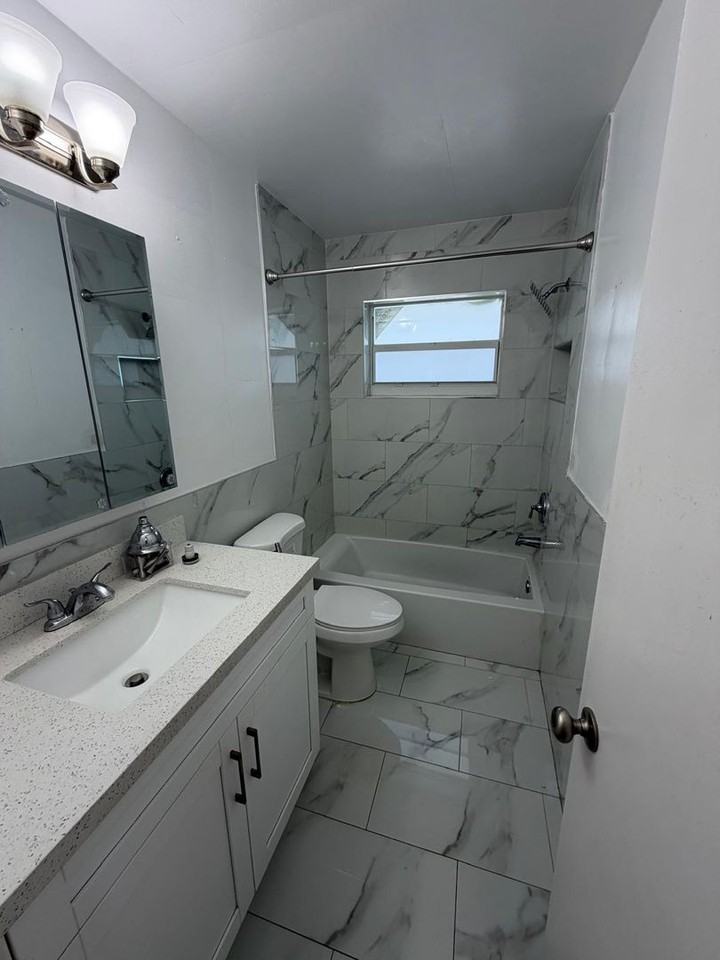 Tova Realty LLC - Photo 5 of 33