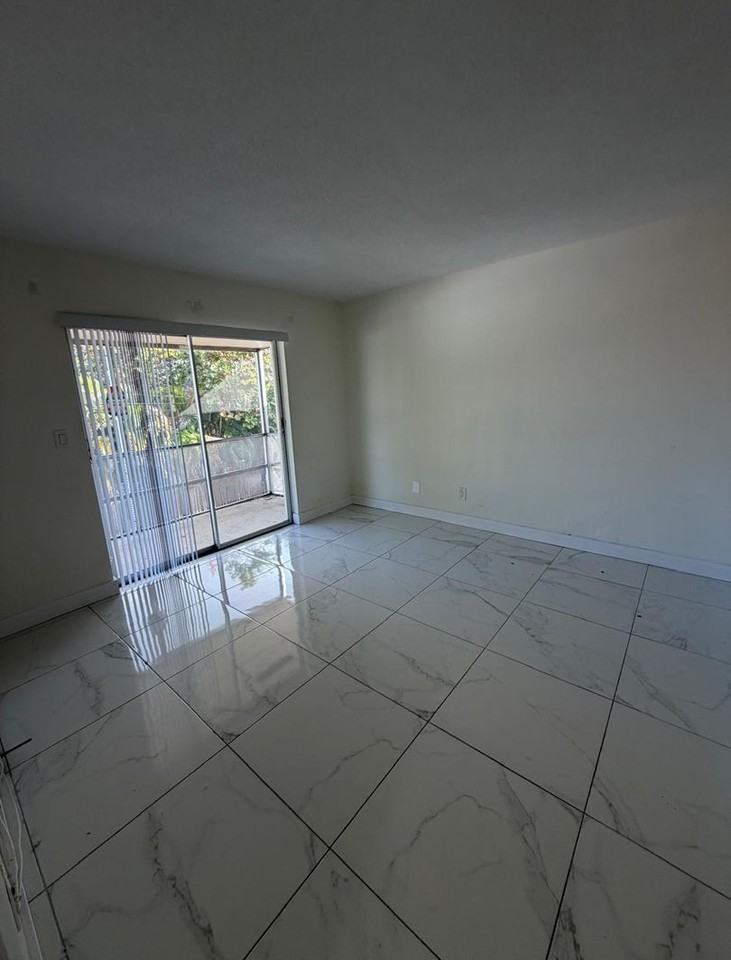 Tova Realty LLC - Photo 7 of 33