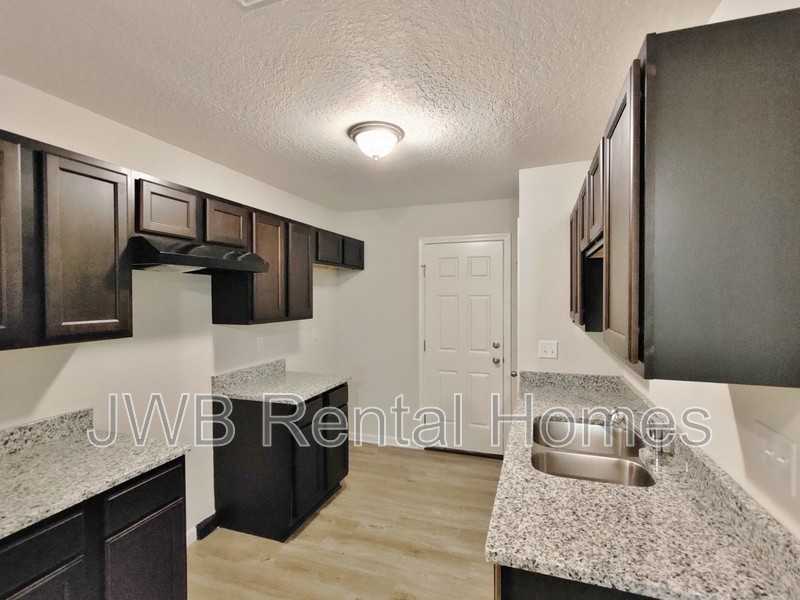 7823 Dekle Ave - Photo 3 of 9