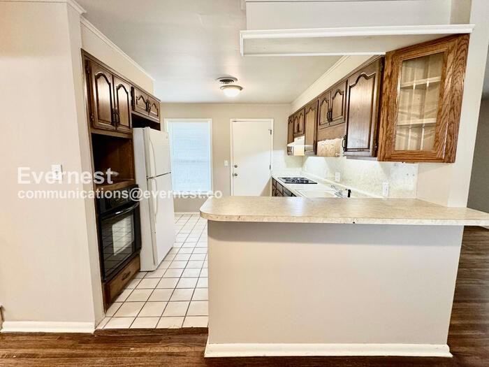 5764 E 24th St - Photo 6 of 30