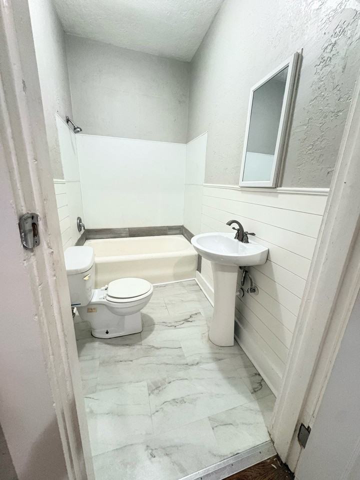 705 Warford St #1-2 - Photo 6 of 9