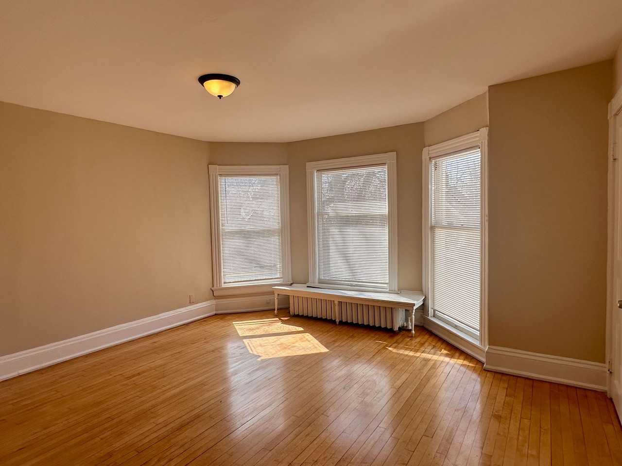 Updated 4BR/2BA in the Water Tower District $3200 – Spacious, Sunny & Steps from Lake Drive - Photo 3 of 17