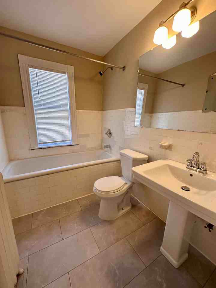 Updated 4BR/2BA in the Water Tower District $3200 – Spacious, Sunny & Steps from Lake Drive - Photo 7 of 17