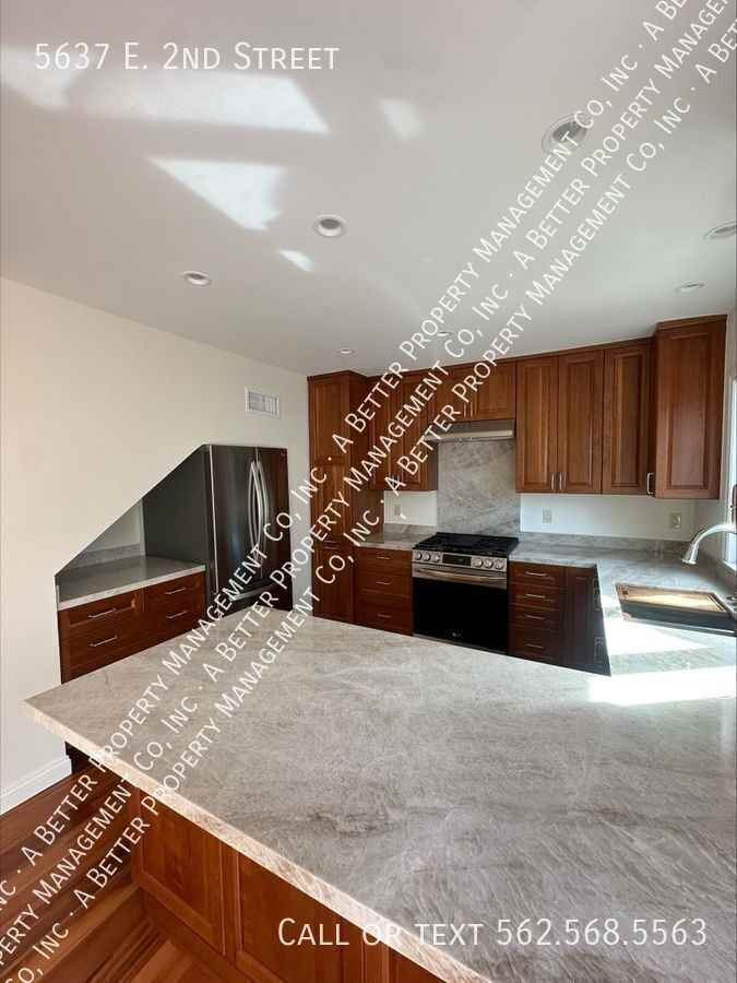 5637 E 2nd St - Photo 7 of 15