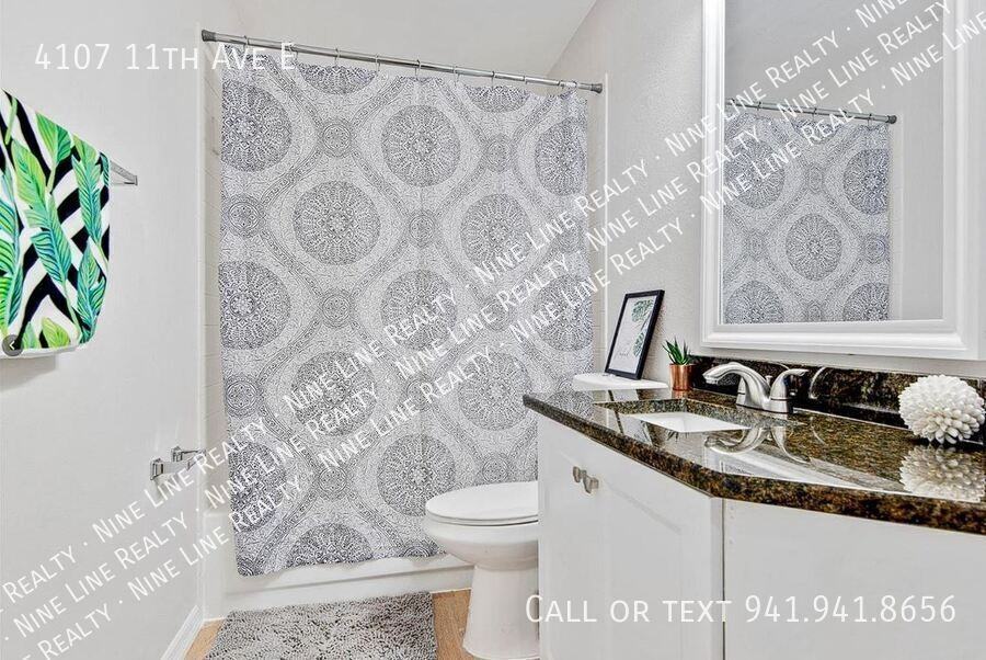 4107 11th Ave E - Photo 6 of 37