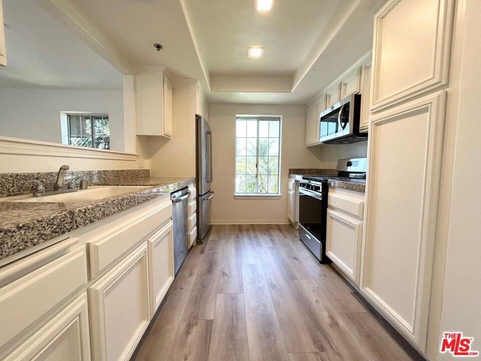 11734 Montana Ave Apt 406 - Photo 4 of 14