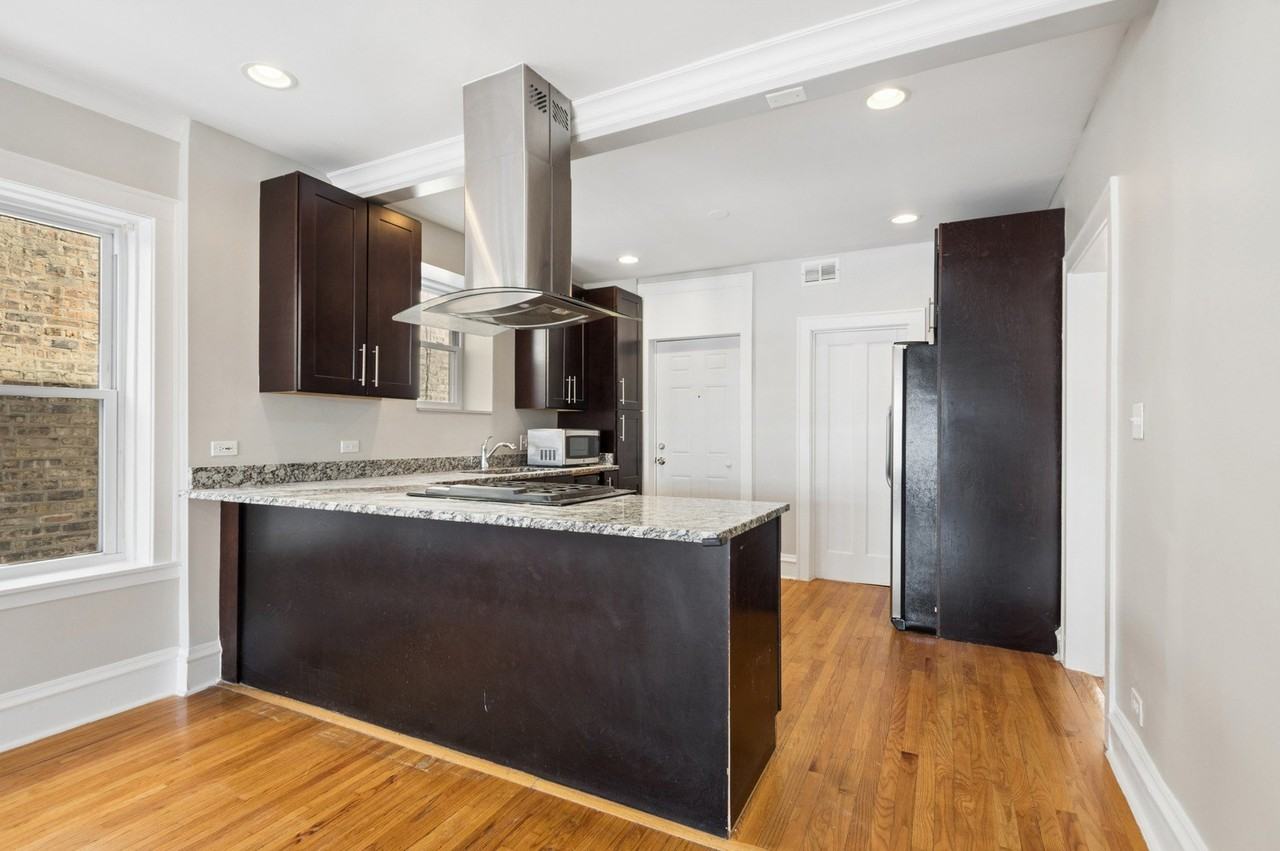 4945 N Kilpatrick Ave Apt 1 - Photo 7 of 15