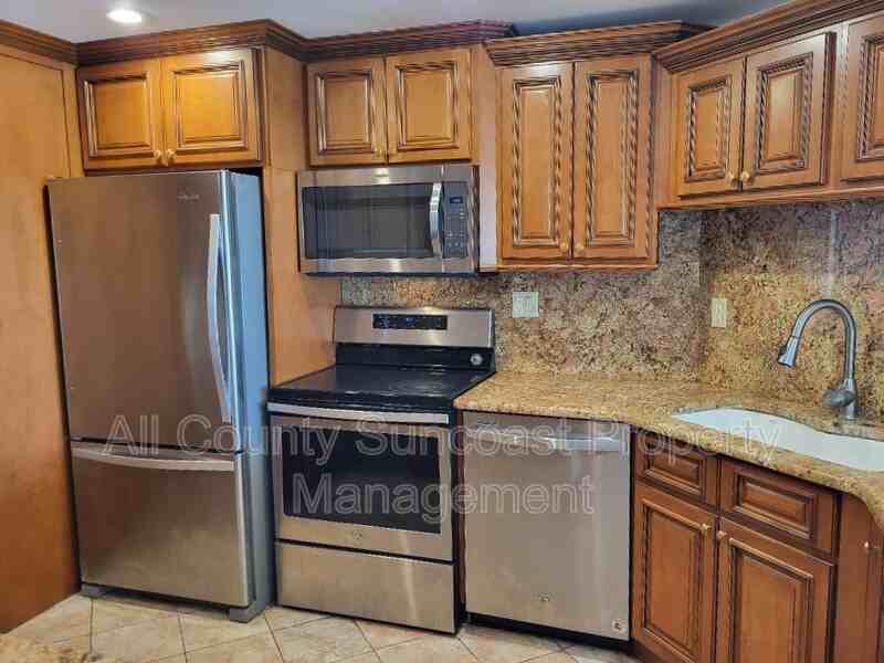 7400 Sun Island Dr S #205 - Photo 5 of 19