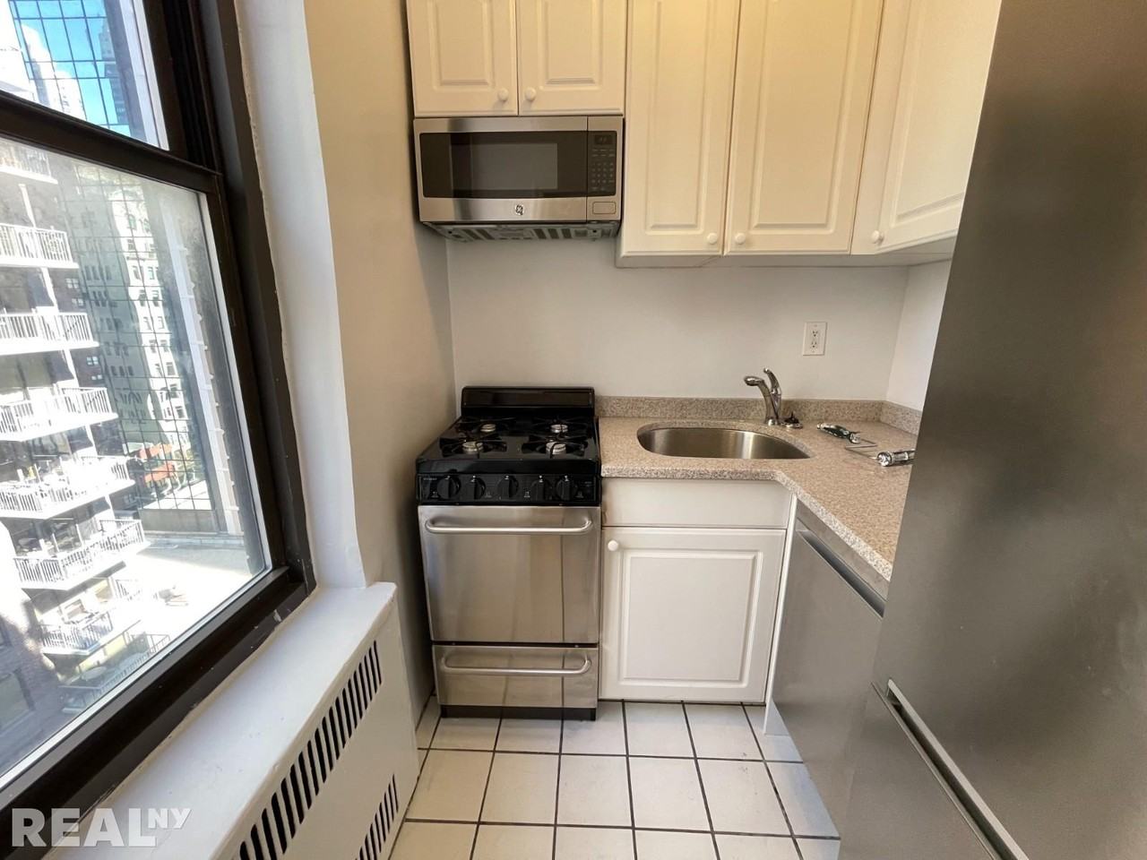 141 E 56th St - Photo 2 of 5