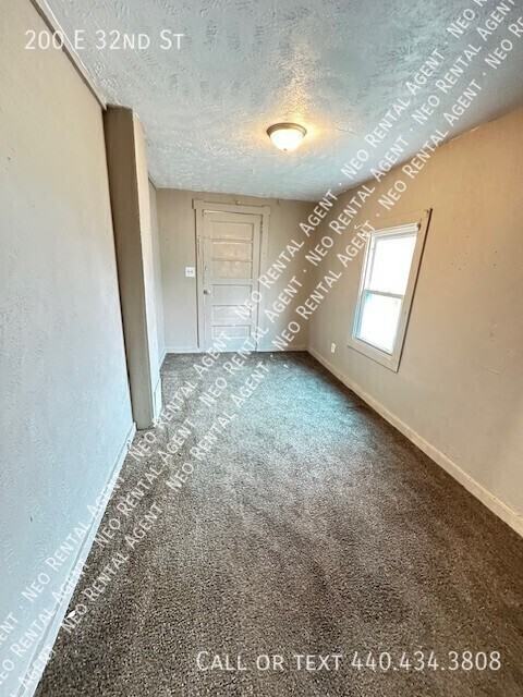 200 E 32nd St - Photo 6 of 9