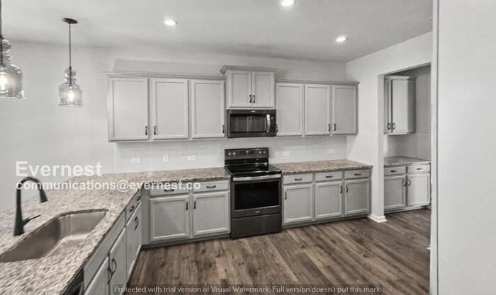 1006 Brooksland Pl - Photo 4 of 29