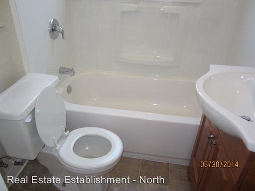 218 N Olive St - Photo 3 of 4