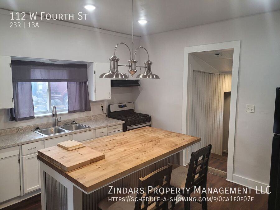 112 W 4th St - Photo 5 of 9