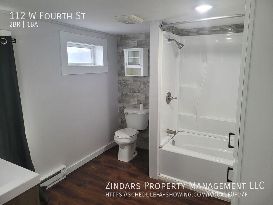 112 W 4th St - Photo 6 of 9