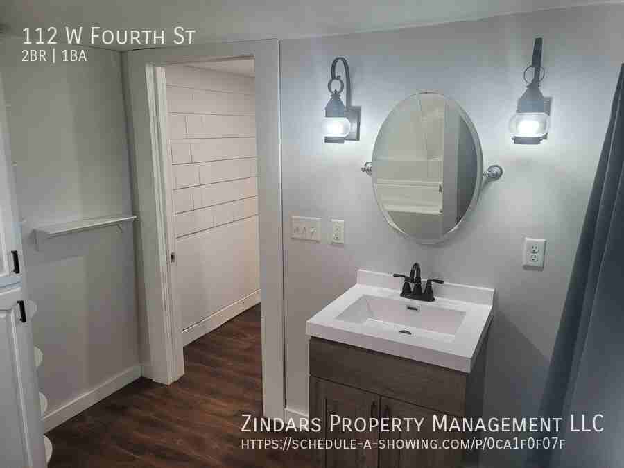 112 W 4th St - Photo 7 of 9