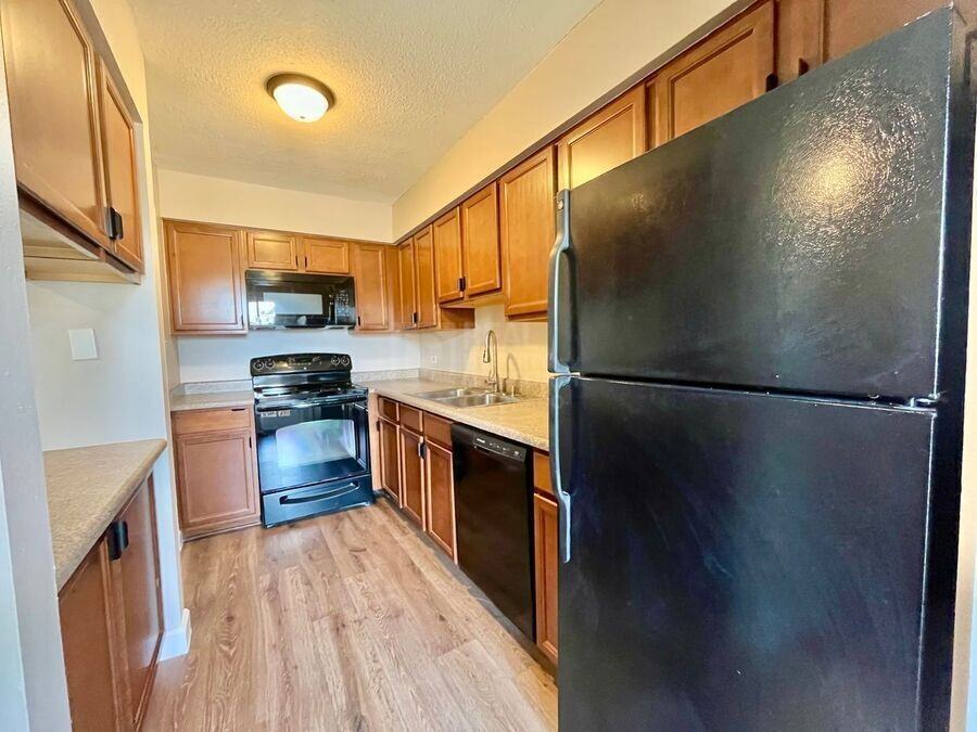 7110 S Gaylord St Apt J2 - Photo 3 of 14