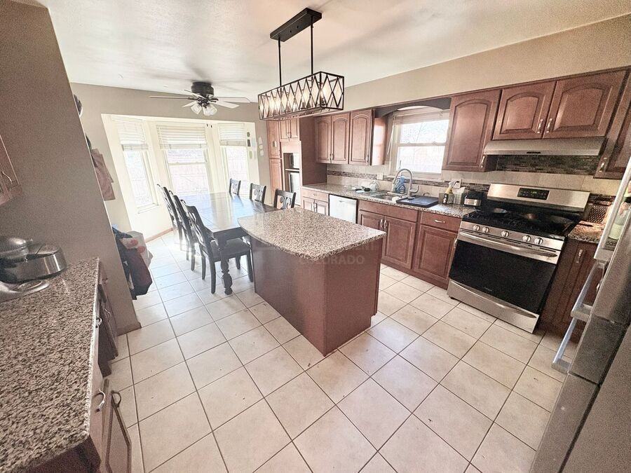 12198 E Vassar Dr - Photo 3 of 22