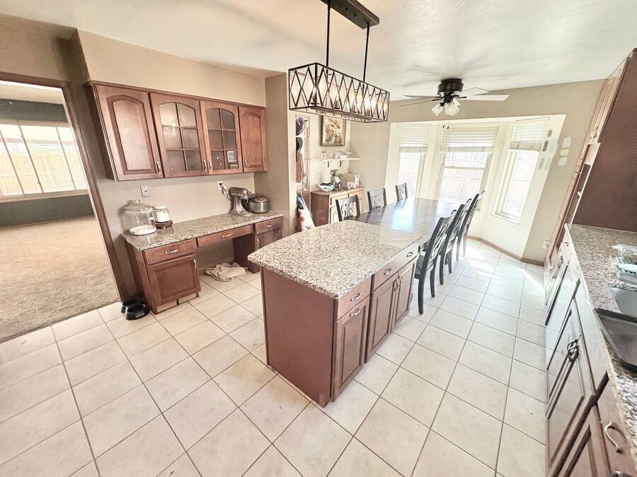 12198 E Vassar Dr - Photo 4 of 22