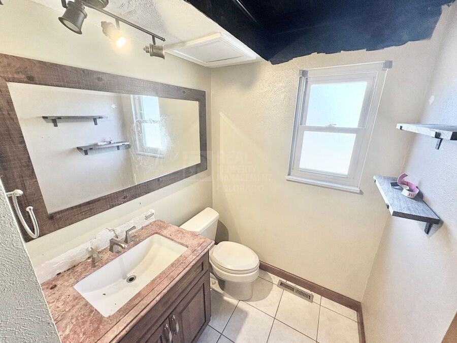 12198 E Vassar Dr - Photo 5 of 22