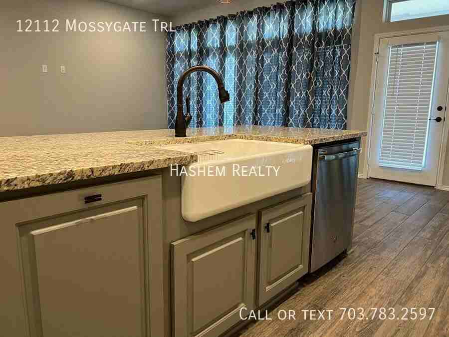 12112 Mossygate Trl - Photo 4 of 31