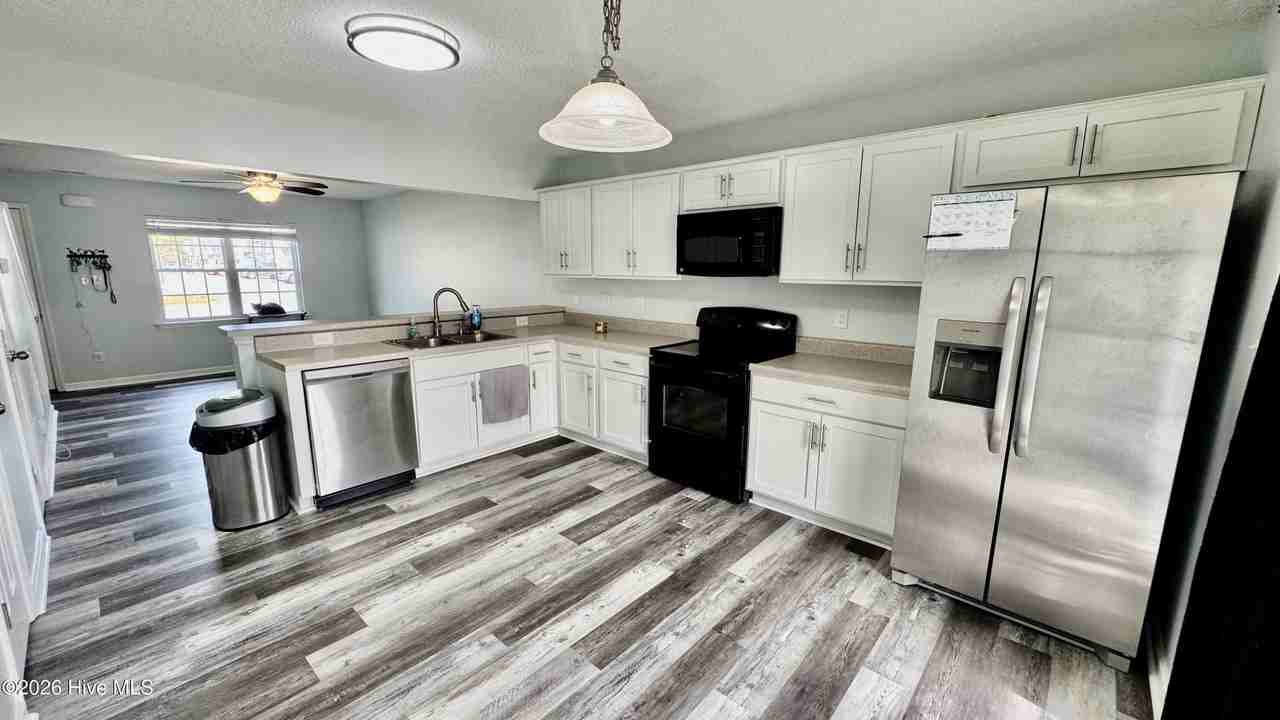 5001 Grandeur Ave - Photo 6 of 17