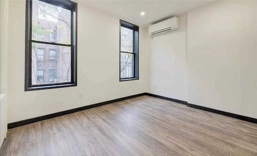 439 W 46th St - Photo 3 of 6