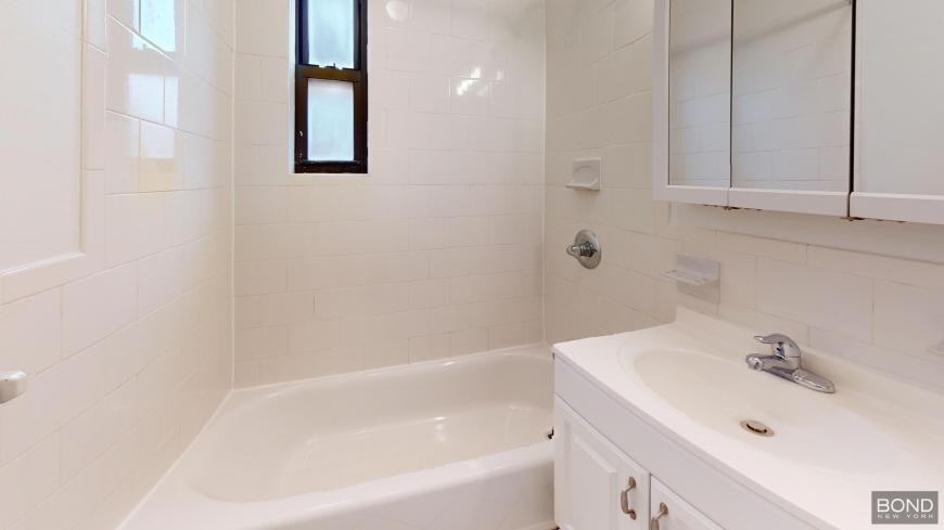 401 E 75th St - Photo 7 of 8