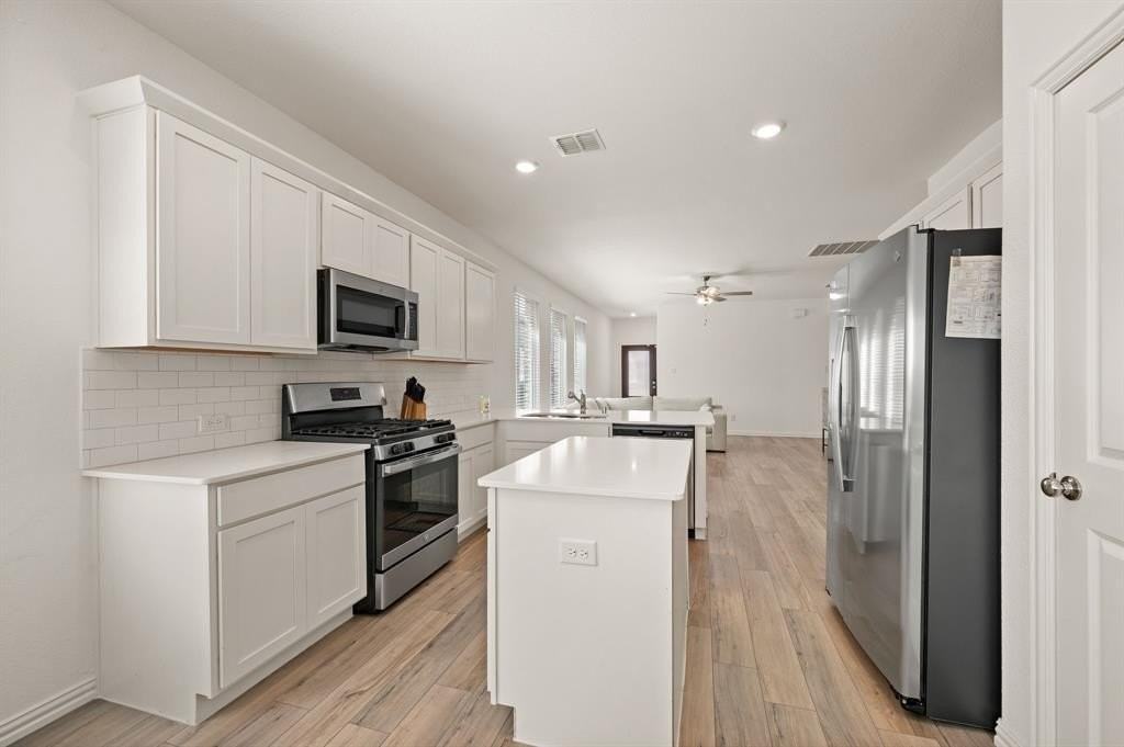 1216 Western Yarrow Ave - Photo 7 of 31