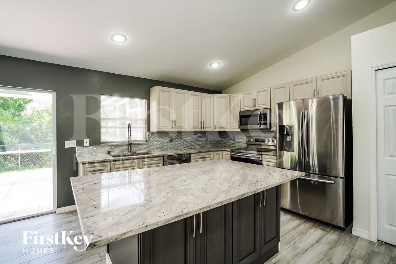 8451 Caloosa Rd - Photo 4 of 15