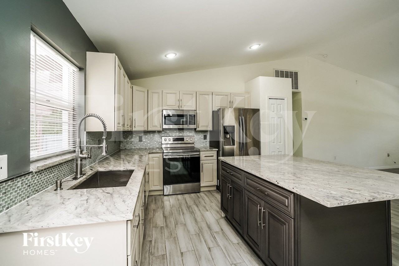 8451 Caloosa Rd - Photo 5 of 15