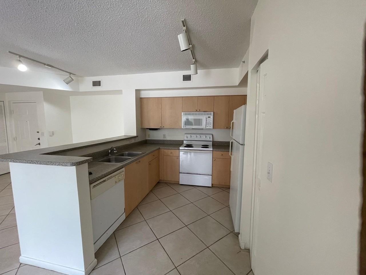 8010 N Nob Hill Rd #205 - Photo 4 of 14