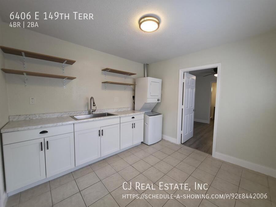 6406 E 149th Ter - Photo 5 of 11