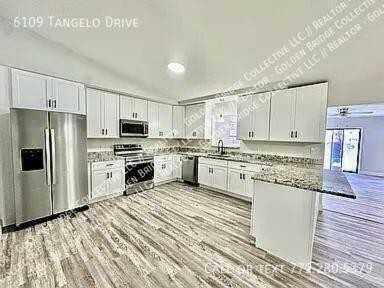 6109 Tangelo Dr - Photo 3 of 9