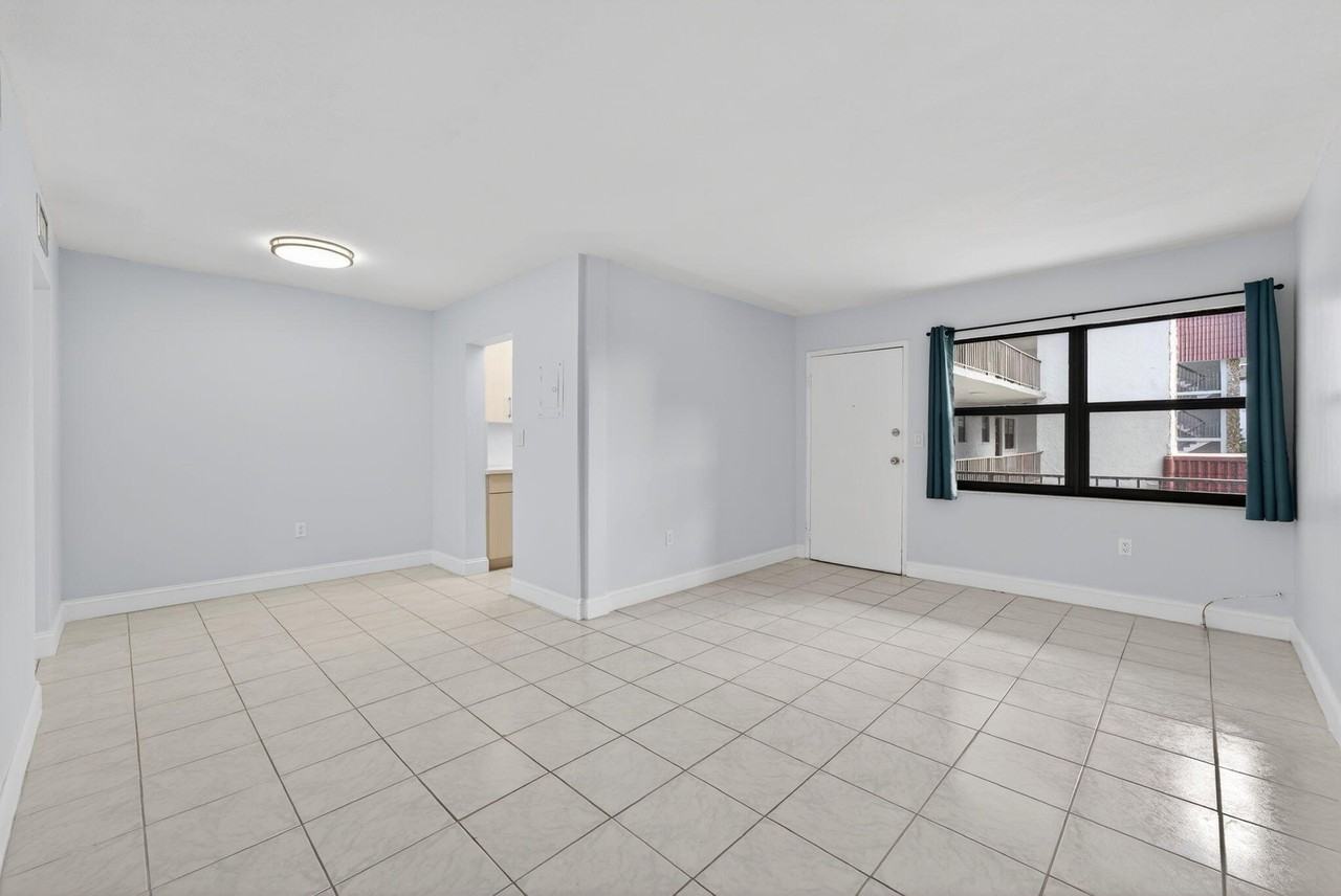 1335 W 68th St Apt 208 - Photo 3 of 20