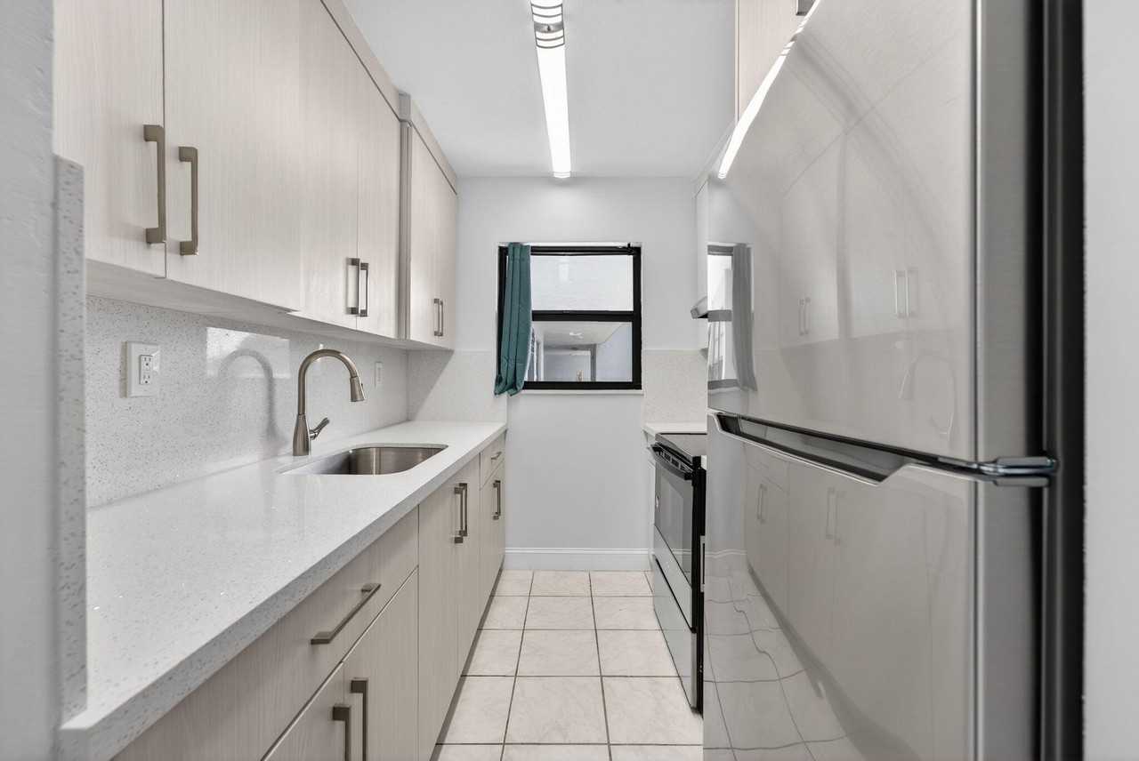 1335 W 68th St Apt 208 - Photo 5 of 20