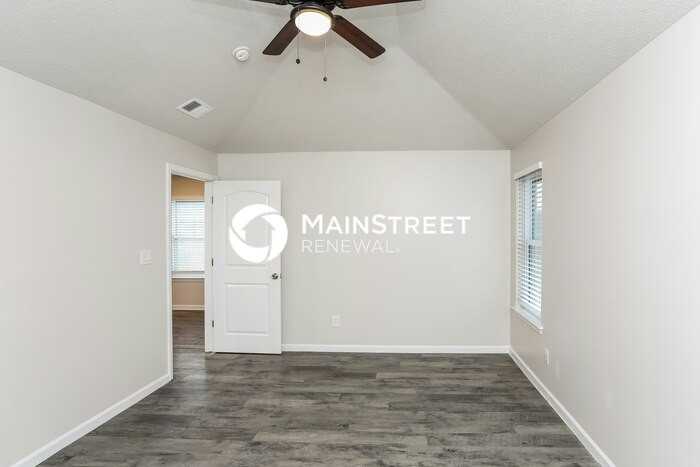10426 Redmond Cir N - Photo 7 of 16