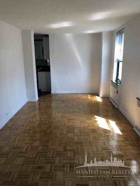 E 38th St #2000 - Photo 3 of 20