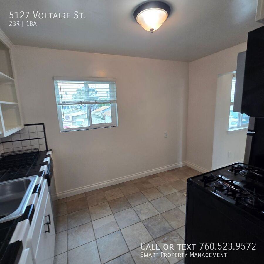 5127 Voltaire St - Photo 3 of 31