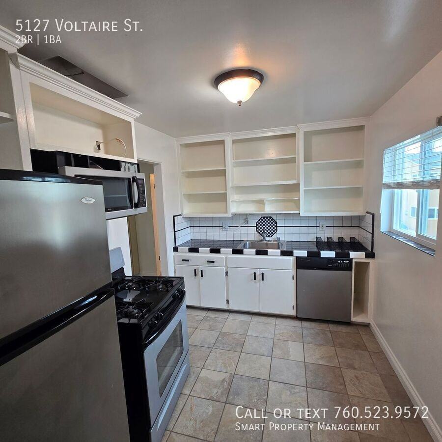 5127 Voltaire St - Photo 4 of 31