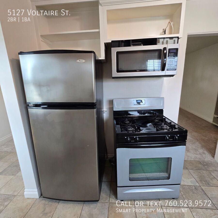 5127 Voltaire St - Photo 5 of 31