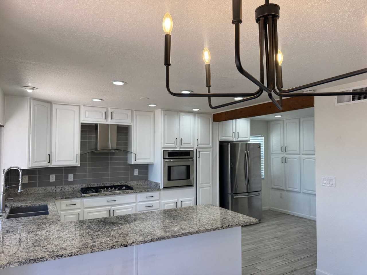 6332 Esther Ave Ne - Photo 5 of 17