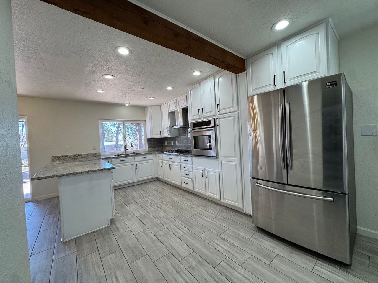 6332 Esther Ave Ne - Photo 6 of 17