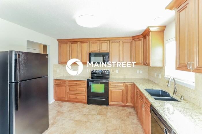 3215 Ne 88th Ter - Photo 6 of 18