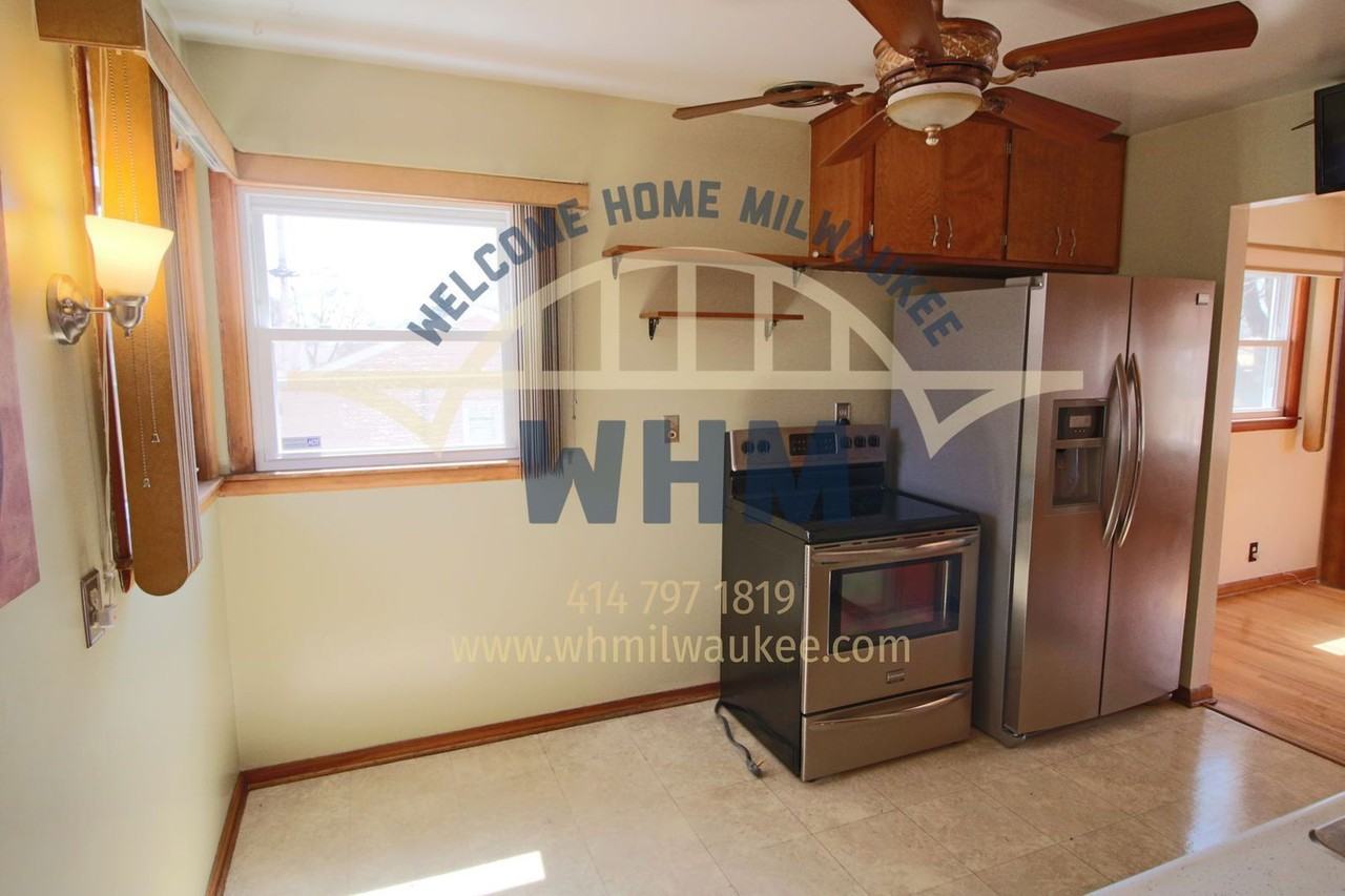 7126 W Tallmadge Pl - Photo 4 of 9