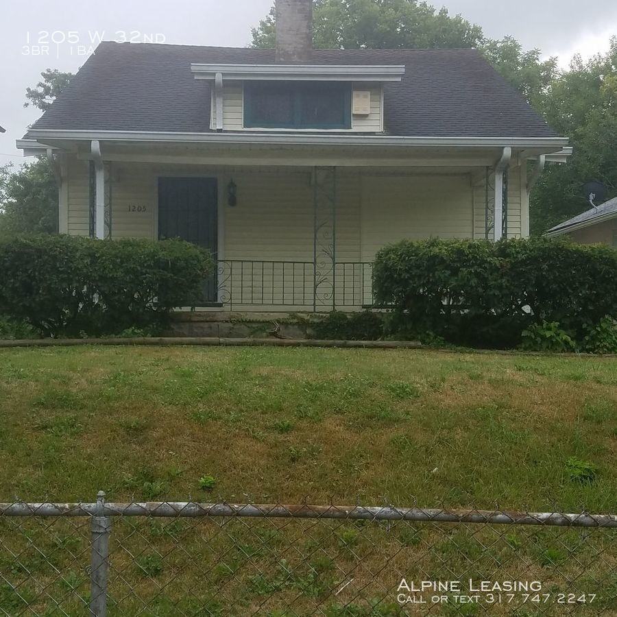 1205 W 32nd St - Photo 4 of 7