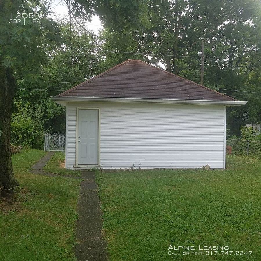 1205 W 32nd St - Photo 7 of 7