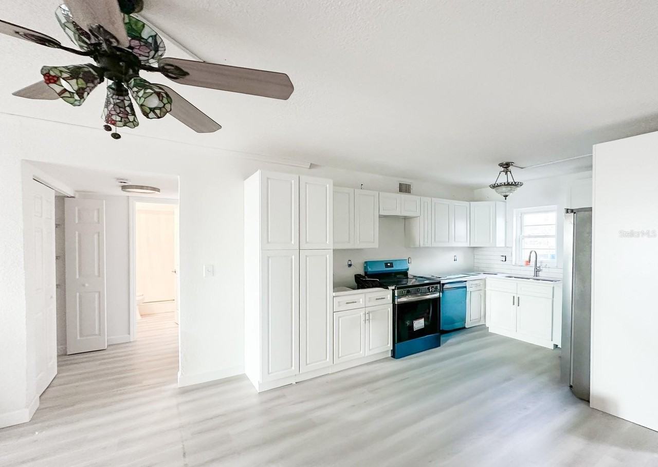 7910 Sun Island Dr S #101 - Photo 7 of 16