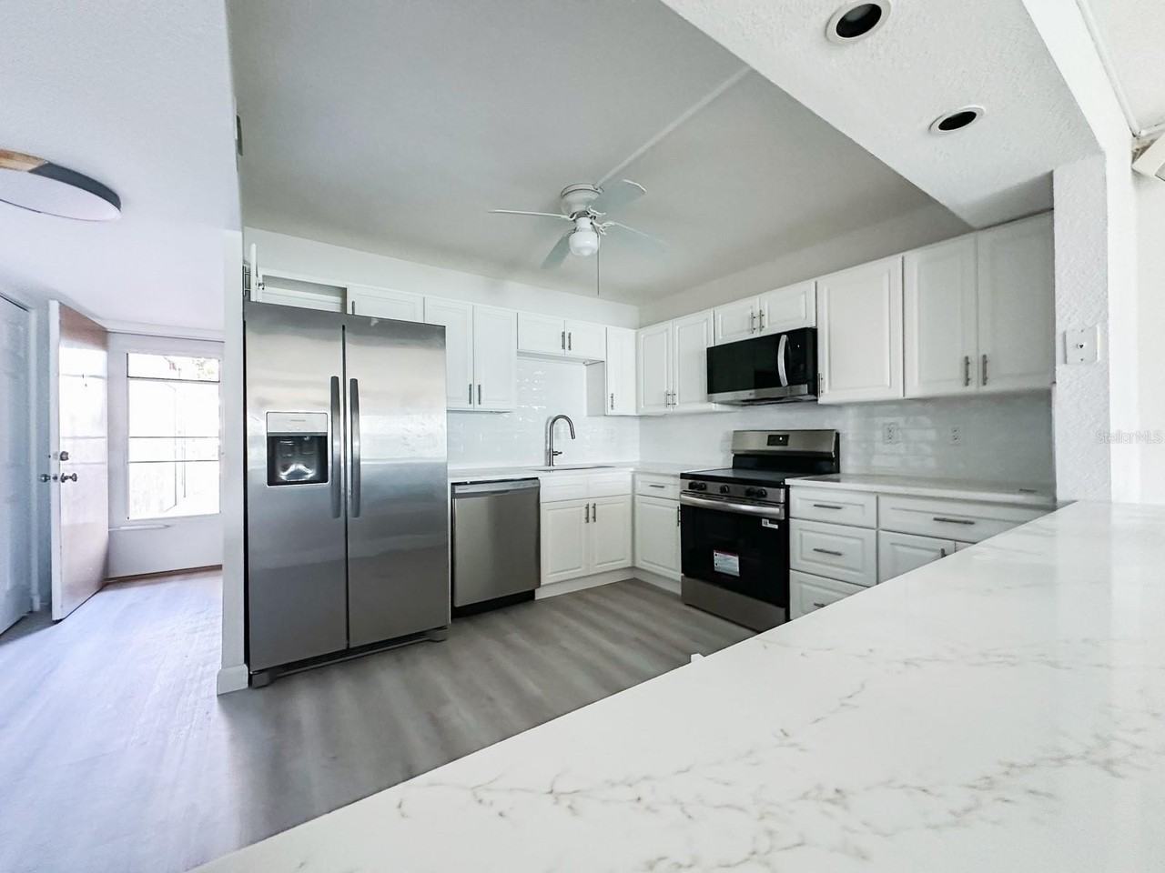 7910 Sun Island Dr S #105 - Photo 3 of 21