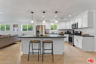 5211 Allott Ave - Photo 6 of 8