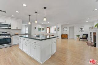 5211 Allott Ave - Photo 7 of 8